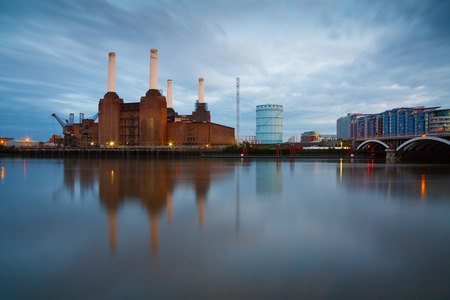 Battersea power plant reflecting on river Thames, London の写真素材