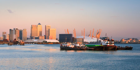 Looking towards Canary Wharf from North Greenwich over river Thames and O2 Arena のeditorial素材