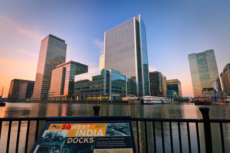 Evening in the South Dock and Canary Wharf at the background のeditorial素材
