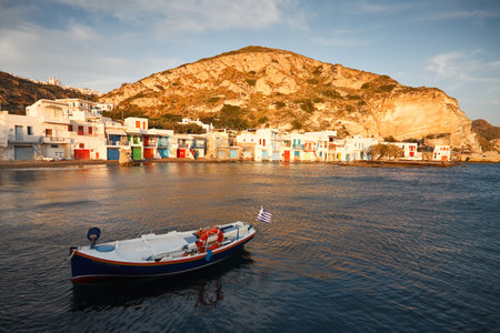 Fishing Boat and boat houses in Klima village on the coast of Milos island, Cyclades, Greece.のeditorial素材
