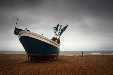Fishing boat on a beach in Hastings harbour, East Sussex, UK.の写真素材