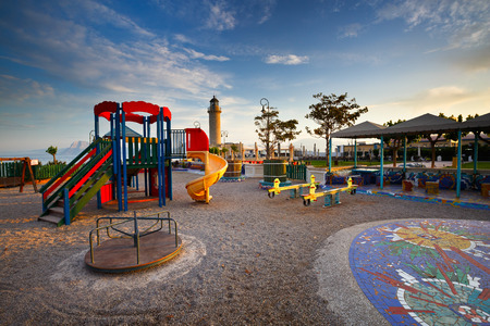 Public playground for children in the park at the lighthouse of Patras.の写真素材
