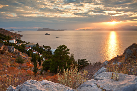 Western end of the town of Hydra and view of the coastline and Peloponnese peninsula.の写真素材