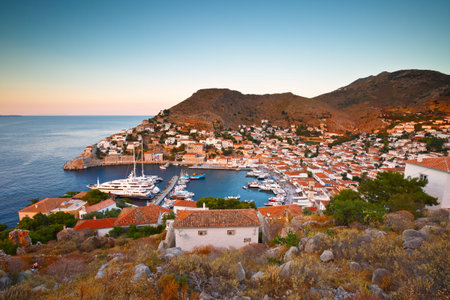 View of port of Hydra from a hill above the town.の写真素材