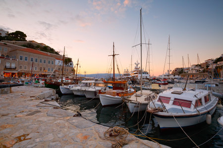 Pier, boats and shops on the seafront of Hydraのeditorial素材
