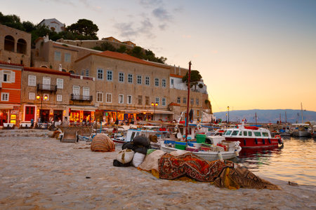 Pier, boats and shops on the seafront of Hydraのeditorial素材