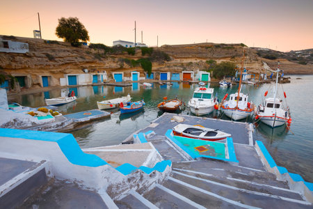 Small harbour with fishing boats in Mandrakia village on the northern coast of Milos islandのeditorial素材