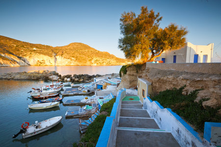 Small harbour with fishing boats in Mandrakia village on the northern coast of Milos islandのeditorial素材