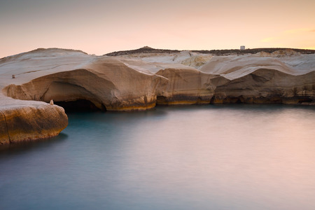 Coastal scenery with pale volcanic rocks near Sarakiniko beach in Milos island, Greece.の写真素材