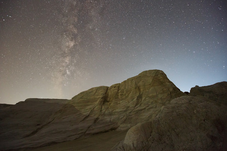 Night photograph of volcanic rock formations nearby Sarakiniko beach in the north of Milos island, Greece.の写真素材