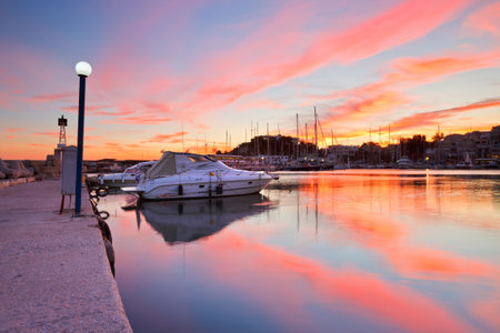 Boats mooring at a pier in Mikrolimano marina in Athens, Greeceのeditorial素材