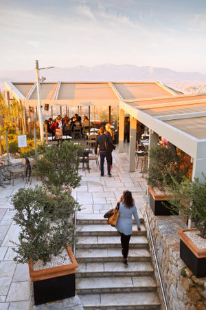 People in the coffee shop on the top of Lycabettus Hill in Athens, Greeceのeditorial素材