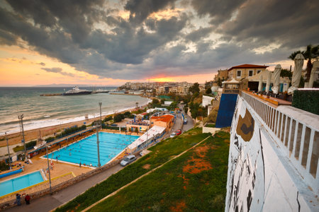 View of the municipal swimming pool in Piraeus and mouth of Zea marina, Greeceのeditorial素材