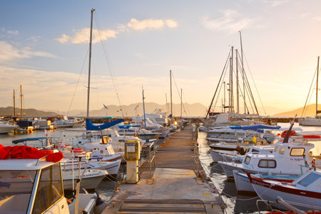 Fishing boats and sail boats in the port of Aegina, Greece.のeditorial素材