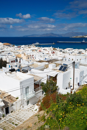 View of Mykonos town and Tinos island in the distance, Greece.の写真素材