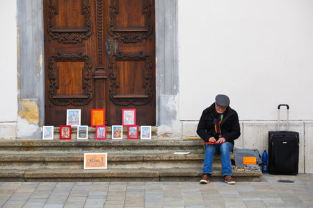 Artist selling his work in the streets of Bratislava, Slovakia.のeditorial素材