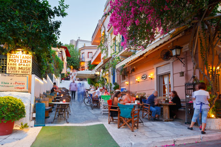 People having drinks in the old town of Plaka.のeditorial素材
