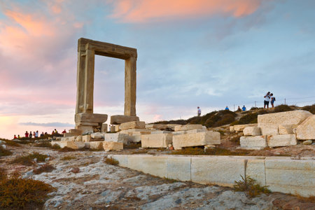 View of Portara and remains of temple of Apollo at sunset.のeditorial素材