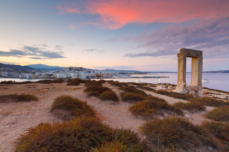 View of Portara and remains of temple of Apollo at sunrise.の写真素材