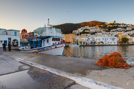 Fishing boat in the port of Agia Marina village on Leros island in Greece early in the morning.のeditorial素材