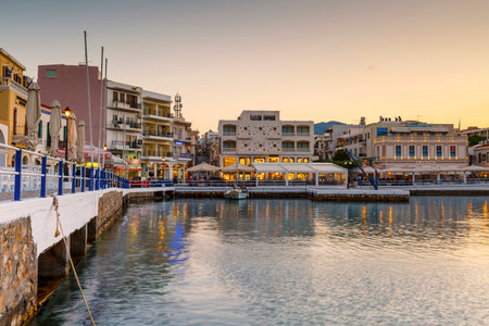 Evening view of Agios Nikolaos and its harbor, Crete, Greece.のeditorial素材