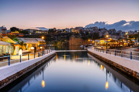 Evening view of Agios Nikolaos and its harbor, Crete, Greece.のeditorial素材