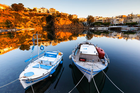 Morning view of Agios Nikolaos and its harbor, Crete, Greece.のeditorial素材