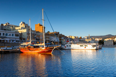 Morning view of Agios Nikolaos and its harbor, Crete, Greece.のeditorial素材