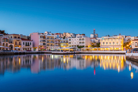 Morning view of Agios Nikolaos and its harbor, Crete, Greece.のeditorial素材