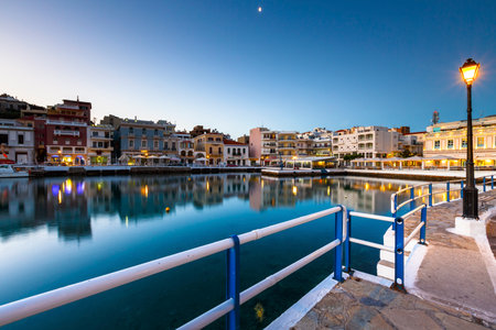 Morning view of Agios Nikolaos and its harbor, Crete, Greece.のeditorial素材