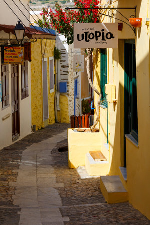 Street with shops in Ano Syros village on Syros island.のeditorial素材