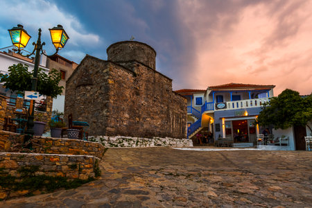 Main square with coffee shops in Chora of Alonissos island, Greece.のeditorial素材