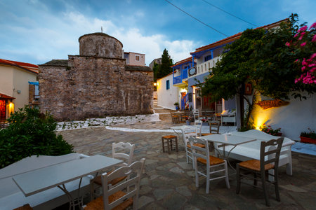 Main square with coffee shops in Chora of Alonissos island, Greece.のeditorial素材
