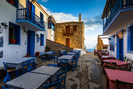 Restaurants in the main street of Chora of Alonissos island, Greece.のeditorial素材