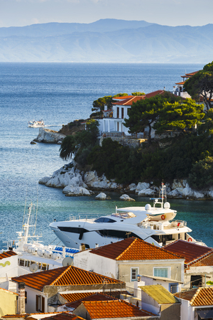 View of the old harbour on Skiathos island and Euboea in the distance, Greece.の写真素材