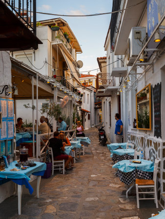 Restaurants in the old town of Skiathos in Sporades, Greece.のeditorial素材
