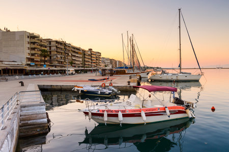 Sail boats in the harbour of Volos city as seen early in the morning.のeditorial素材