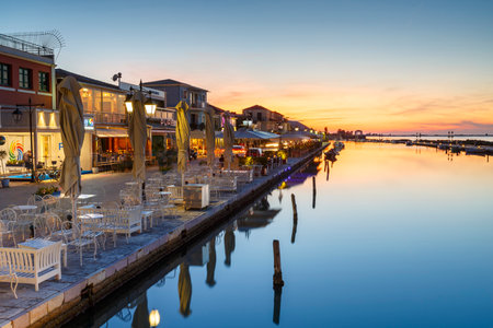 Coffee shops and restaurants in the harbour of Lefkada town, Greece.のeditorial素材