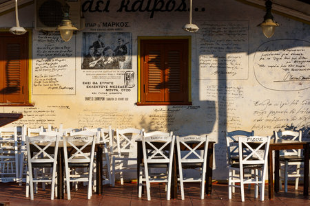 Tables of a coffee shop in Lefkada town, Greece.のeditorial素材