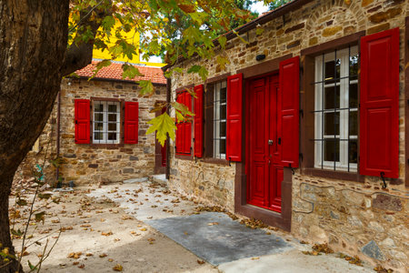 Architecture in the old town of Chios with red doors and windows.のeditorial素材