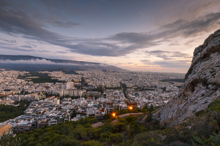 View of city of Athens from Lycabettus hill at sunset, Greece.の写真素材