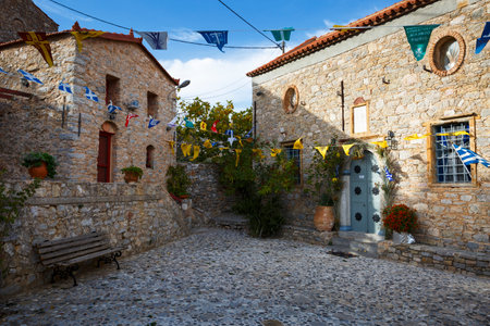 Stone houses and a church in Anavatos village on Chios island in Greece.のeditorial素材