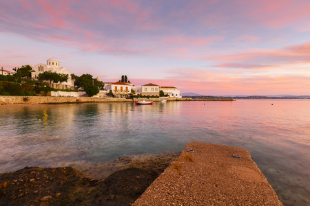 Houses and a church in the harbor of Spetses village, Greece.の写真素材