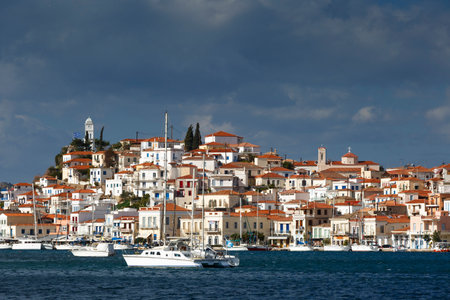 View of the Chora village of Poros island over the sea, Greece.のeditorial素材