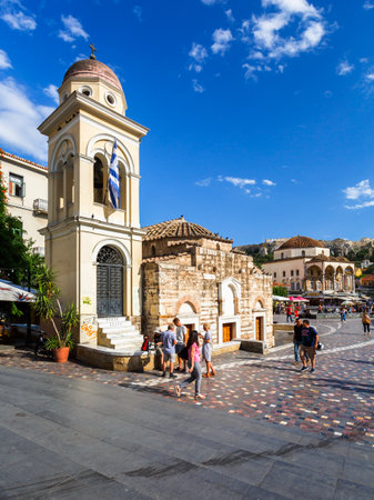 Athens, Greece - May 30, 2018: Tourists at a church in Monastiraki square in the old town of Athens, Greece.のeditorial素材
