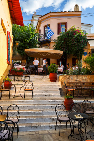 Athens, Greece - May 30, 2018: Taverna and a coffee shop in Plaka district of Athens, Greece.のeditorial素材