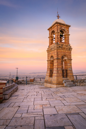 Bell tower of the 19th century Chapel of St. George on the summit of Lycabettus hill in Athens, Greece.の写真素材