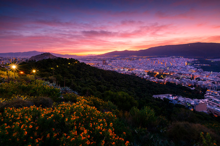 View of northern Athens and Hymettus mountain from Lycabettus hill at dawn.の写真素材