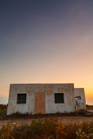 Molos, Greece - June 17, 2017: Abandoned building on the coast near Molos village on Skyros island, Greece.のeditorial素材