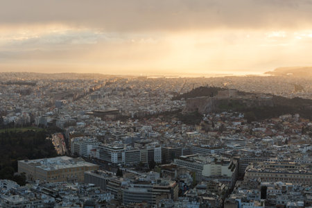 View of Acropolis and Athens from Lycabettus hill at sunset, Greece.